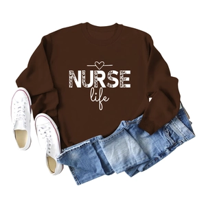 Dark brown crewneck sweatshirt with NURSE Life leopard print design and blue jeans