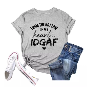 Minimalist grey crewneck T-shirt with 'FROM THE BOTTOM' slogan print and denim jeans