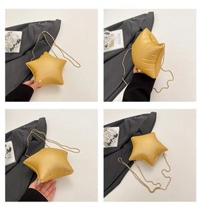 Detail shots of yellow star-shaped crossbody bag with gold chain and zipper closure