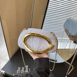 Chic light gray pleated clutch with large gold metal ring handle and crossbody chain strap