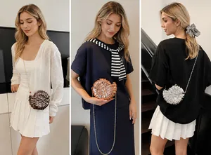 Detailansicht der Abendtasche in Muschelform mit Tragemöglichkeiten als Clutch oder Kette