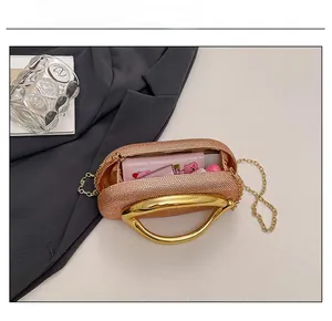 Interior view of vintage gradient PU clutch showing capacity for phone and makeup