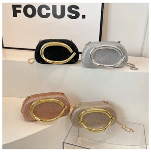 Detail of luxury gradient evening bags with metallic handles and elegant chain straps