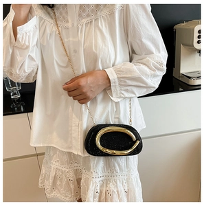 Chic black evening clutch with gradient glitter finish and gold C-shaped metal handle