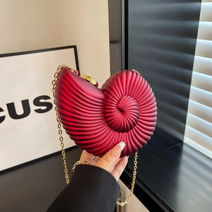 Fashionable dark red acrylic nautilus shell clutch bag with gold chain strap for women