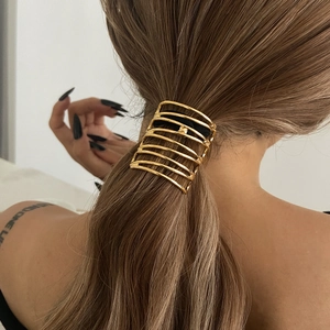 Manchette à cheveux dorée creuse et irrégulière pour coiffure queue de cheval chic