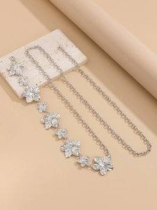 Detailed silver flower link chain featuring embossed petals and adjustable lobster clasp