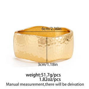 Detail view of gold hammered cuff bangle with dimensions and weight measurements
