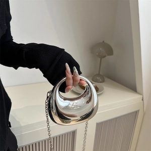 Mini silver crescent evening bag with U-shape design and chain strap for women
