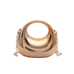 Mini crescent rose gold chain bag with polished mirror finish and ring handle for women