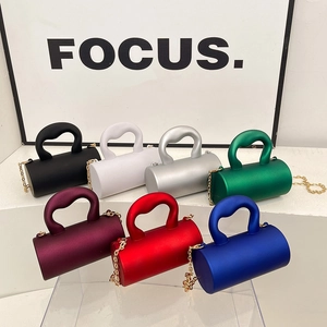 Chic acrylic cylinder evening bags in seven vibrant colors with chain straps