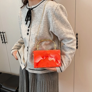 Orange marble acrylic box clutch bag with gold handle and chain strap for women