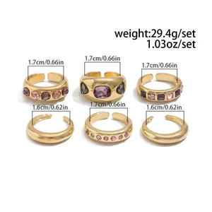 Size chart for 6-piece gold alloy ring set with stones showing diameters and weights