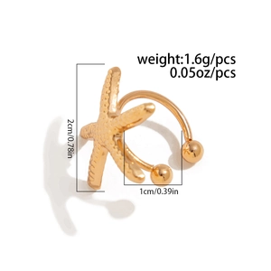 Detailed view of a gold starfish ear cuff showing lifelike texture and 2cm product dimensions