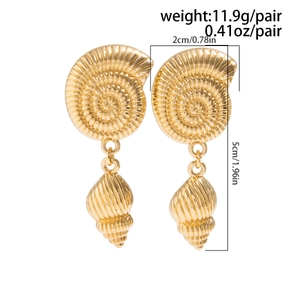 Detailed view of gold nautilus and seashell drop earrings with size specifications