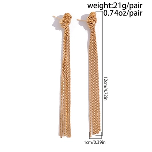 Detail view of 12cm gold tassel earrings with knot design and sleek snake chains