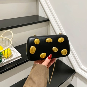 Elegant black PU clutch bag with irregular gold pebble metal decor and chain strap