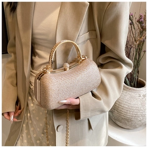 Champagne gold glitter evening box bag with rhinestone handle and decorative gemstone clasp