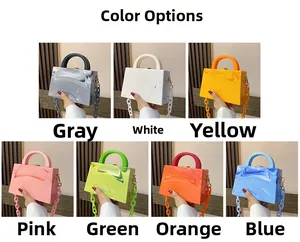 Detail showing acrylic box bags in seven marbled colors with matching resin chains