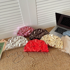 Metallic acrylic clutch bags in five colors with chain straps and pleated texture