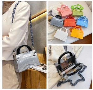 Detail view of marble pattern acrylic box bag with chunky chain strap in seven colors