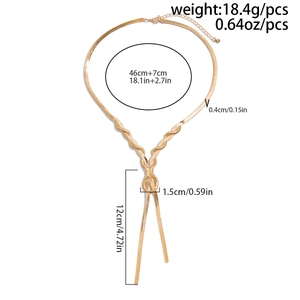 Detailed view of gold Y-shaped snake bone necklace with precise measurements and dimensions