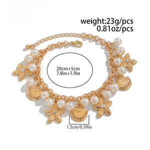 Macro detail of beach anklet with starfish and shell charms including size dimensions
