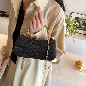 Chic black glitter evening clutch bag with gold chain strap and metal handle