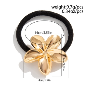 Detailed view of golden flower hair tie with specifications of 4cm size and 9.7g weight