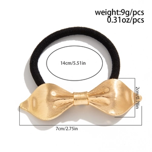 Black high-elastic hair tie with gold metal bow showing dimensions and weight detail