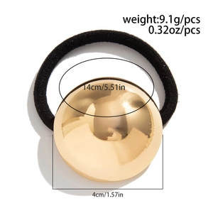 Detail view of gold sphere hair tie showing 4cm diameter and 9.1g weight dimensions