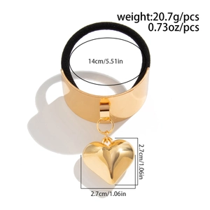 Detail of golden heart pendant hair tie with dimensions 2.7cm and weight 20.7g on white