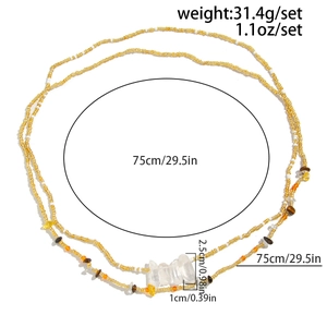 Detail of beaded waist chain with starfish pendant and dimensions of 75cm shown on white