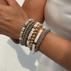 Bohemian stacked beaded bracelets set with MAMA letter beads and wooden elements