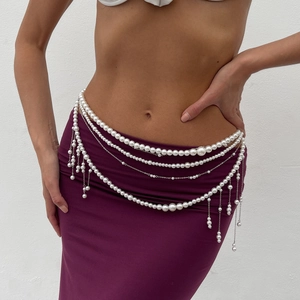 Elegant multilayer pearl body chain waist belt with fringe tassels on purple dress