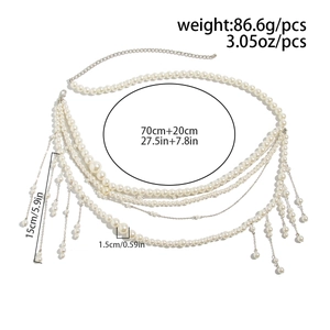 Multi-layer pearl body chain with waist fringe and adjustable metal chain on white backdrop