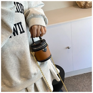 Mini color-block bucket bag with brown lychee leather and gold chain detail