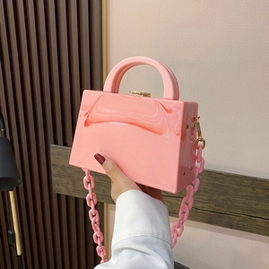 Pink marble acrylic box handbag with top handle and chunky plastic chain strap