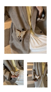 Vue détaillée d'un mini sac papillon doré orné de strass avec une fine chaîne en métal
