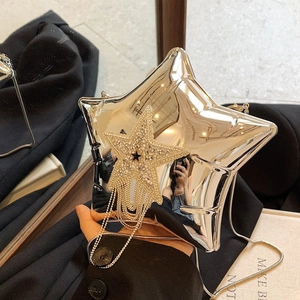 Star shaped silver evening bag with rhinestone tassel and metallic chain strap
