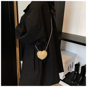 Sparkling gold heart-shaped rhinestone mini bag with elegant metal chain shoulder strap