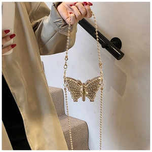 Mini sac papillon doré avec strass scintillants et bandoulière en chaîne de perles