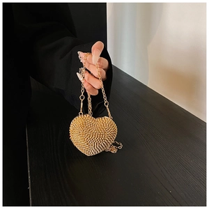 Luxurious gold heart-shaped mini clutch bag with sparkling rhinestones and chain strap