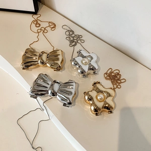 Chic butterfly and flower acrylic chain crossbody bags in metallic gold and silver