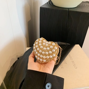 Sparkling heart-shaped pearl mini bag with rhinestone details and gold chain strap