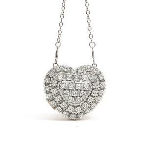 Sparkling silver heart-shaped evening clutch bag with rhinestones and chain strap