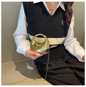 Fashionable moon-shaped acrylic clutch bag with a round handle and chain strap