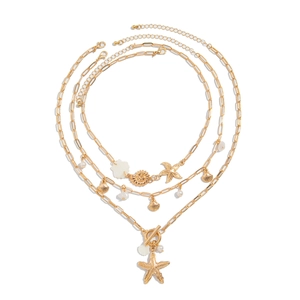 Set di 3 collane dorate a tema oceano con stelle marine, conchiglie e perle