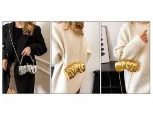 Irreguläre Metallic-Clutch mit Wellentextur und verschiedenen Tragemöglichkeiten