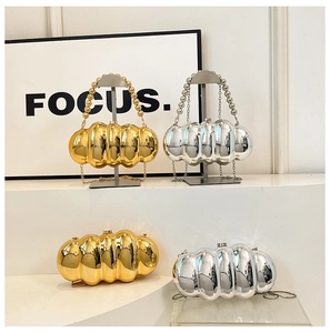 Metallic acrylic caterpillar evening bags with bead handles in gold and silver